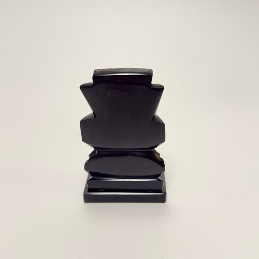 Hand-carved Mexican figurine in black obsidian with mother-of-pearl