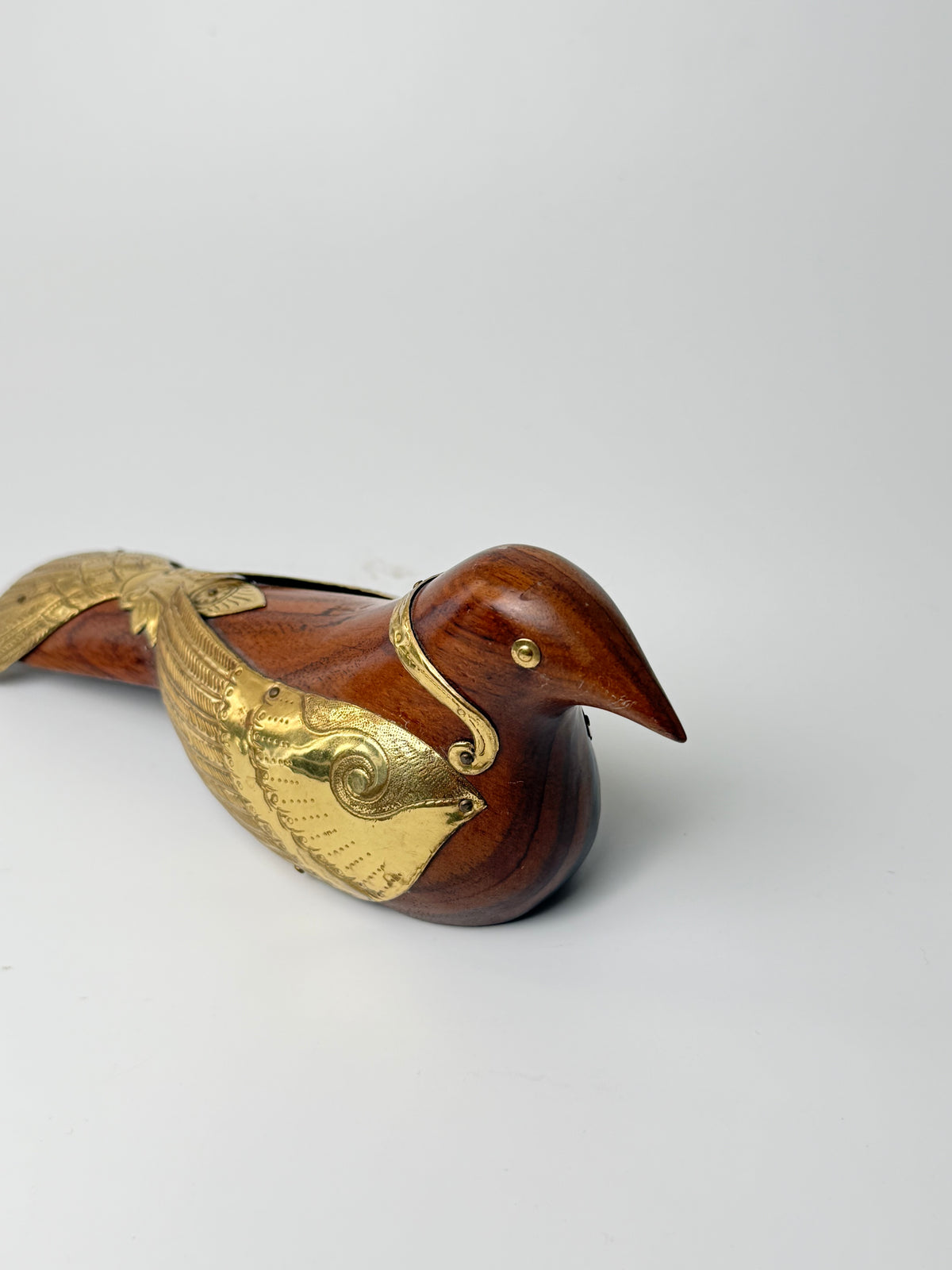 Beautiful bird figurine in rosewood and brass