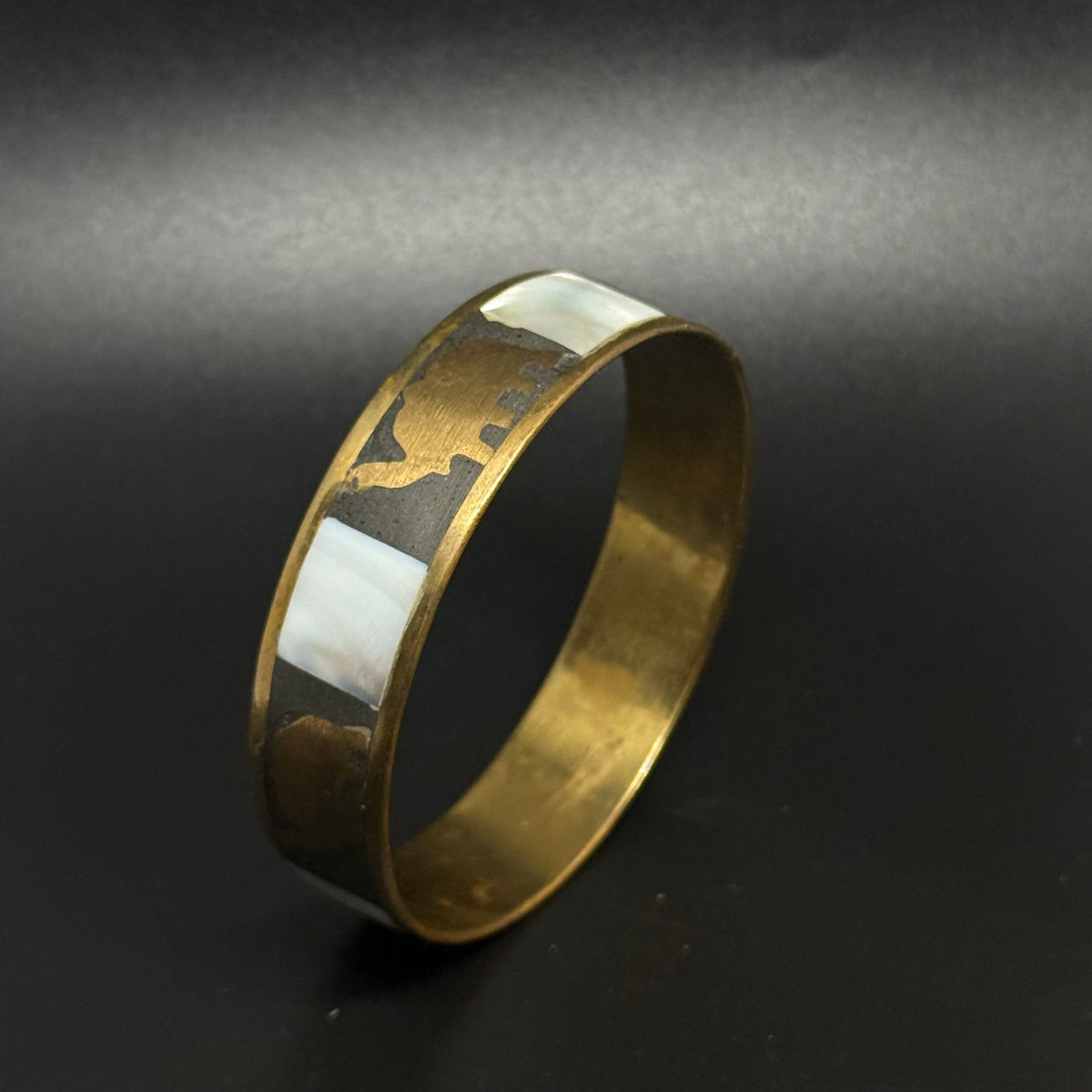 Vintage brass bracelet with mother-of-pearl and elephants