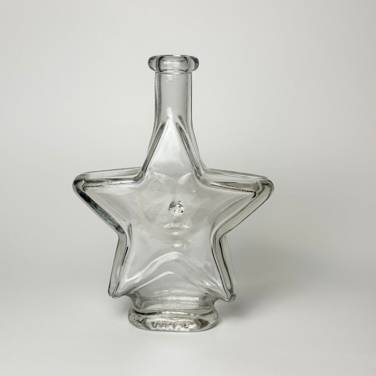Vintage star carafe in clear glass with face – 18 cm
