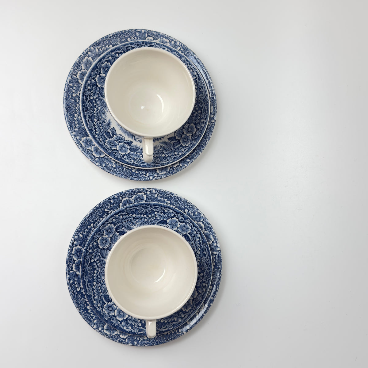 Two trio sets of Imerco 50th anniversary tableware, Rosenborg Castle and Fredensborg Castle 1978
