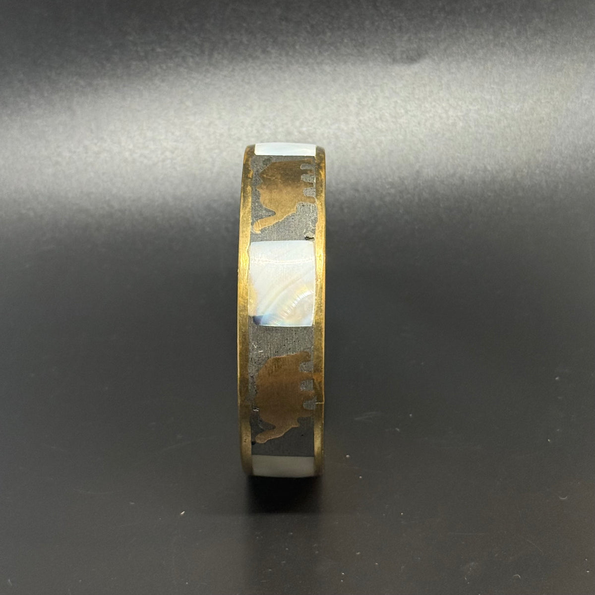 Vintage brass bracelet with mother-of-pearl and elephants