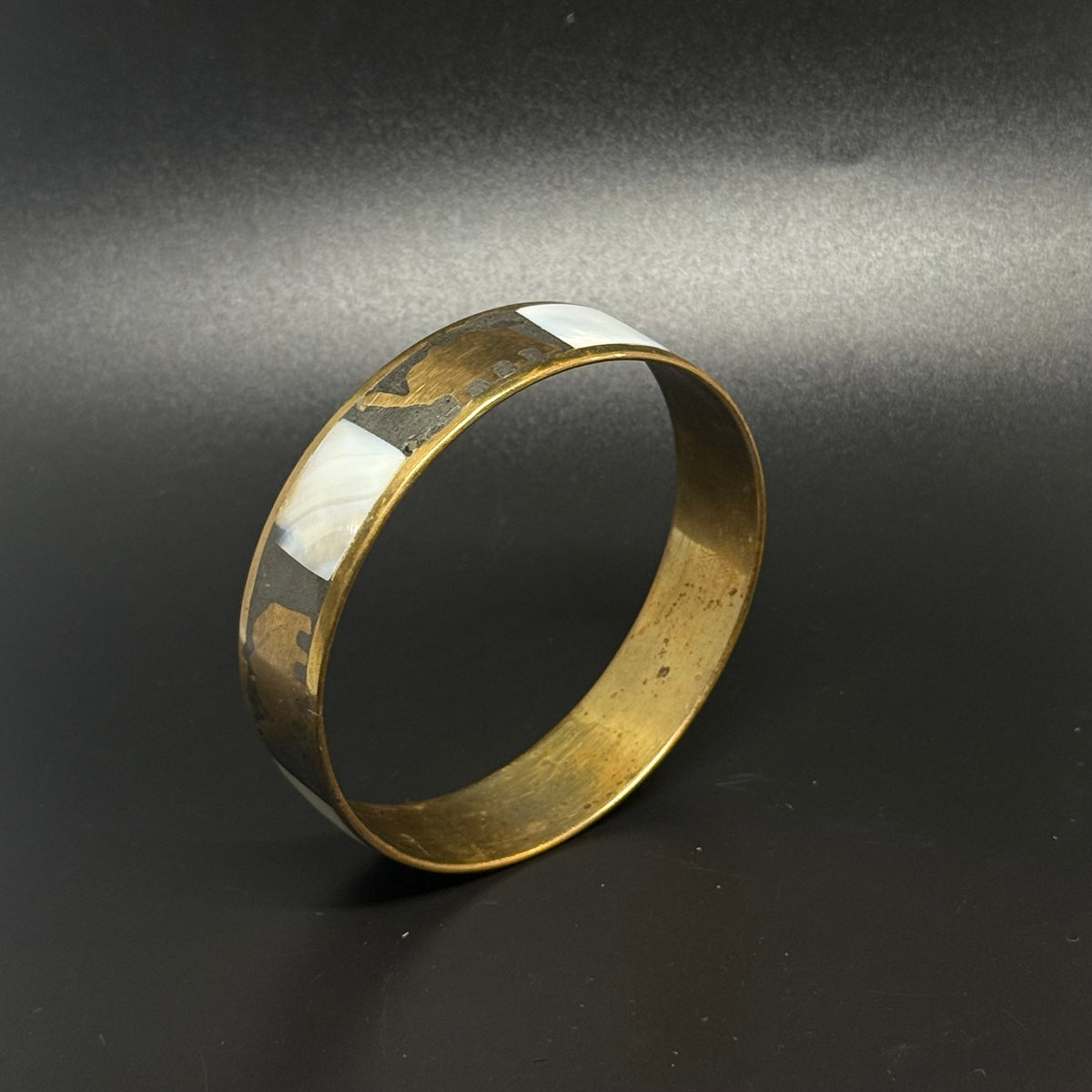 Vintage brass bracelet with mother-of-pearl and elephants