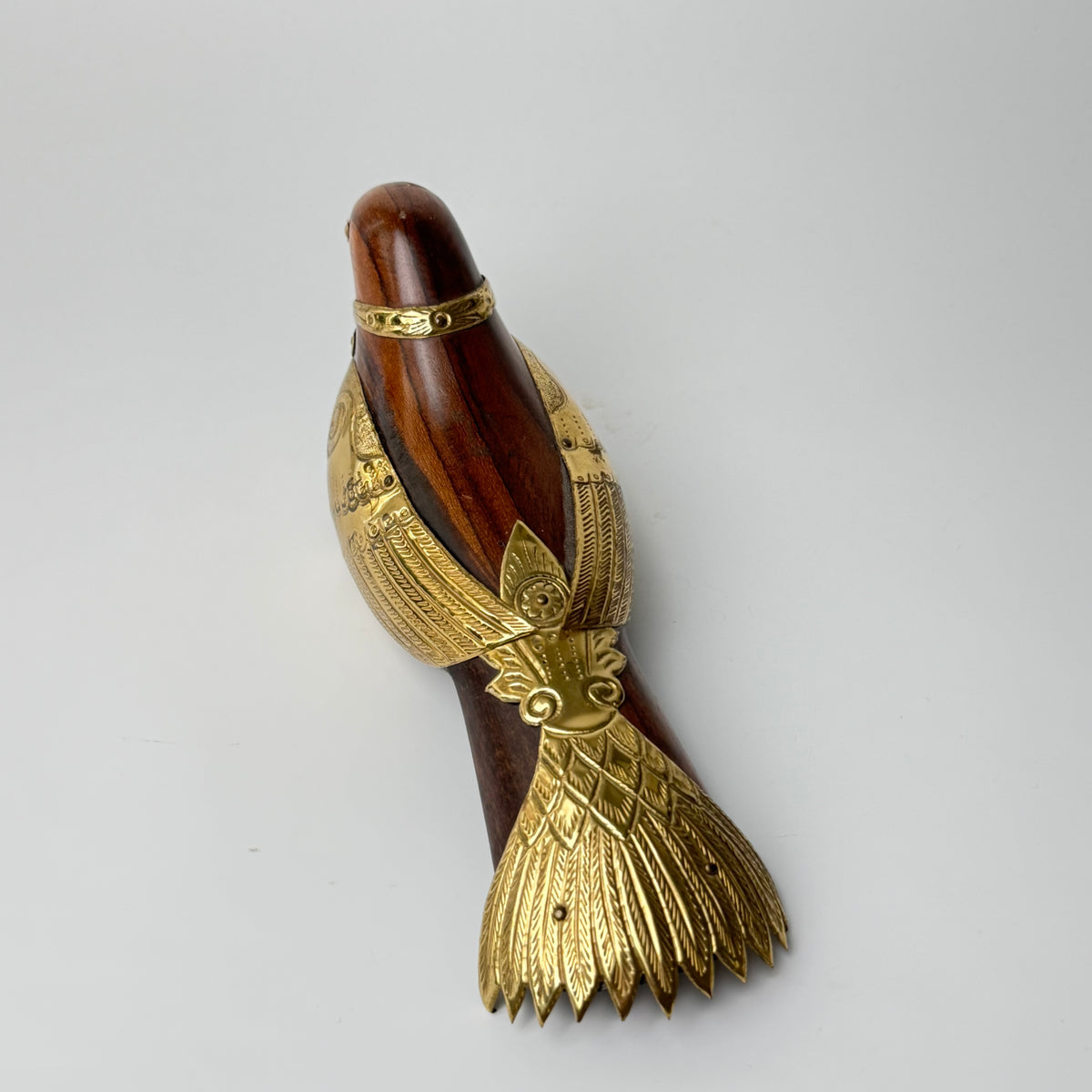 Beautiful bird figurine in rosewood and brass