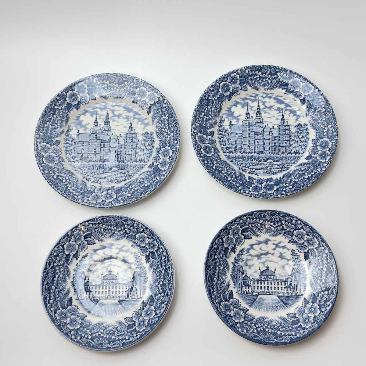Two trio sets of Imerco 50th anniversary tableware, Rosenborg Castle and Fredensborg Castle 1978