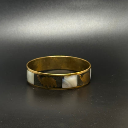 Vintage brass bracelet with mother-of-pearl and elephants