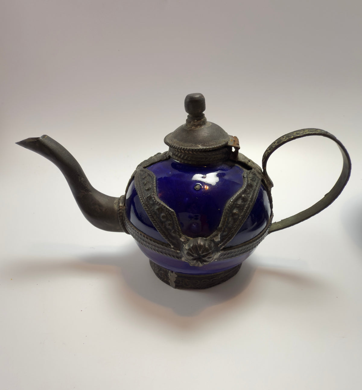 Unique Moroccan decoration set with glass bottle, miniature tajine and teapot